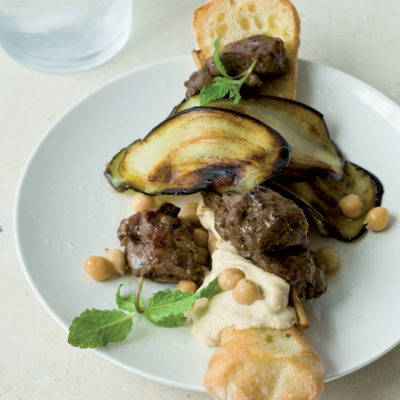 Greek lamb kebab, chargrilled brinjal and hummus on crusty bread sticks