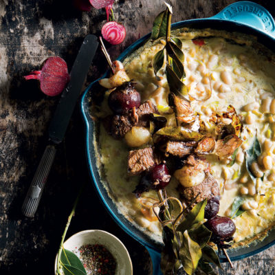 Bay leaf kebabs with baked cannellini beans