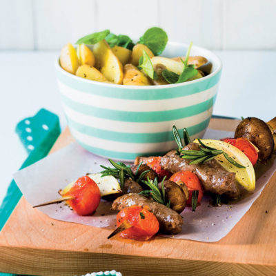 Lamb and veg kebabs with warm potato and watercress salad