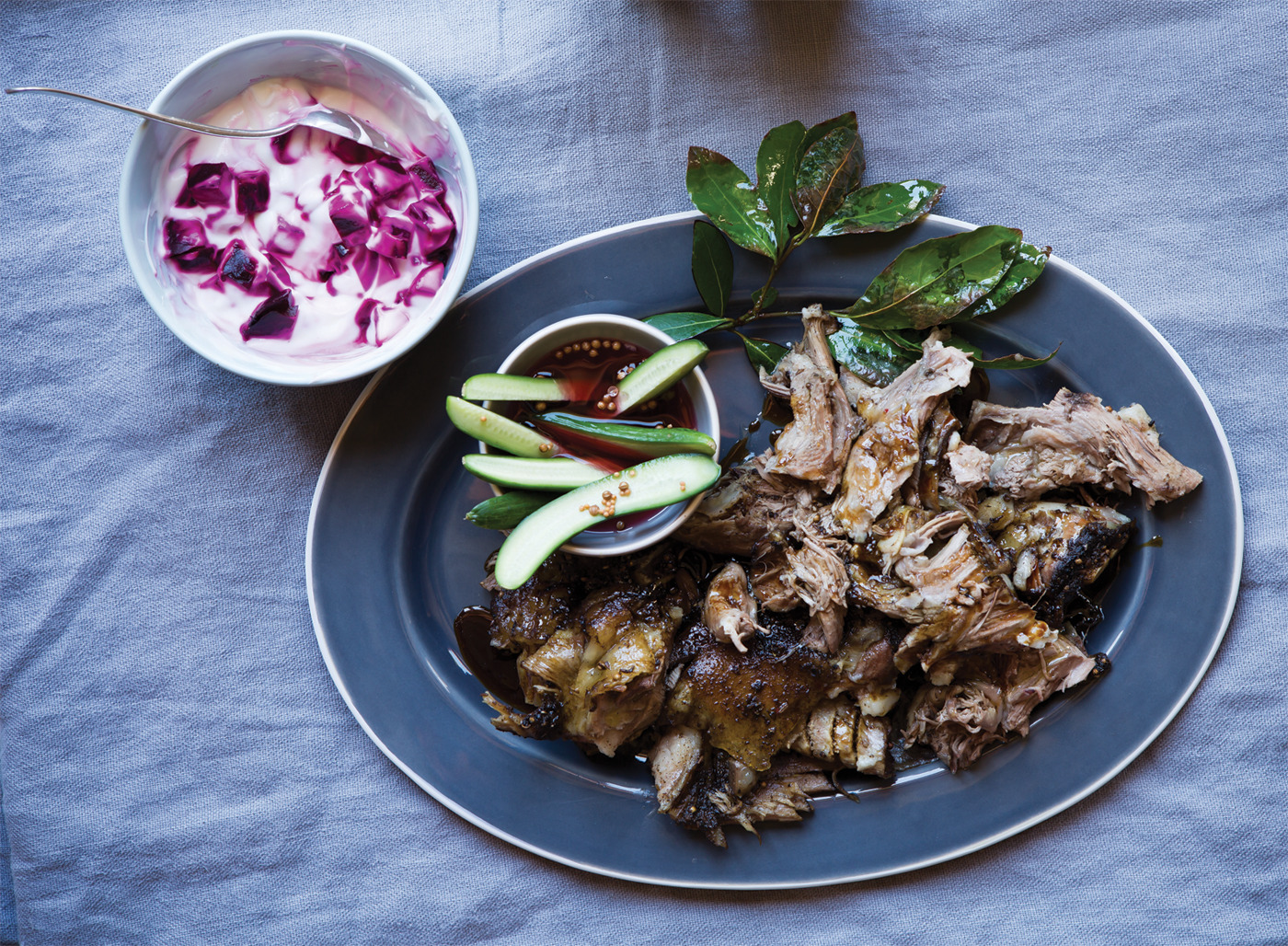 Slow-roasted lamb shoulder with beetroot-swirled tzatziki 