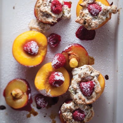 Roast peaches and plums with oats and pistachio meringue