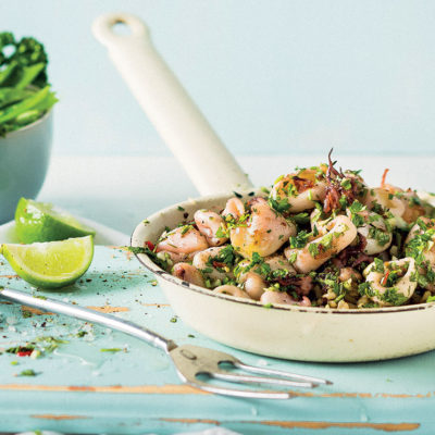 Pan-fried calamari with chilli, garlic and coriander on steamed greens