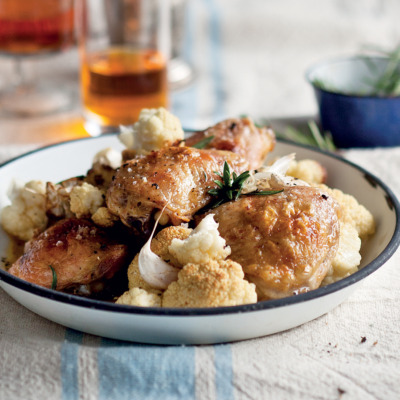 Roast chicken pieces with rosemary and roast cauliflower