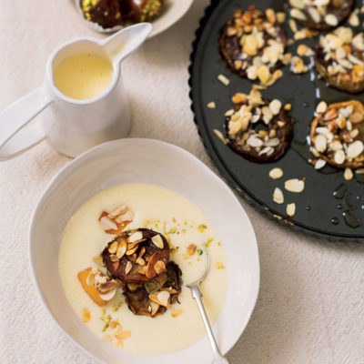 Spiced apple slices with almonds and stuffed dates