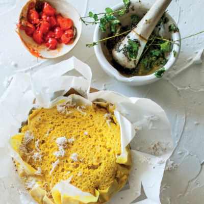 Steamed Indian bread with tomato relish and curry-leaf butter