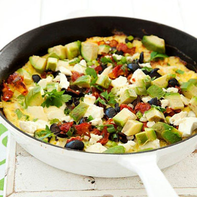 Avocado frittata with sundried tomatoes, feta & olives