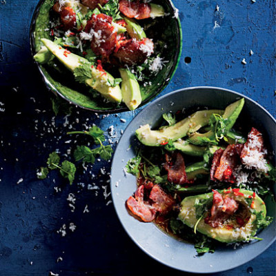 Avocado with crispy bacon dressing