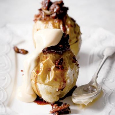 Baked apples with brandy snaps and sticky dates