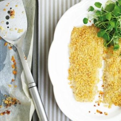 Baked crispy hake with sweet potato and watercress