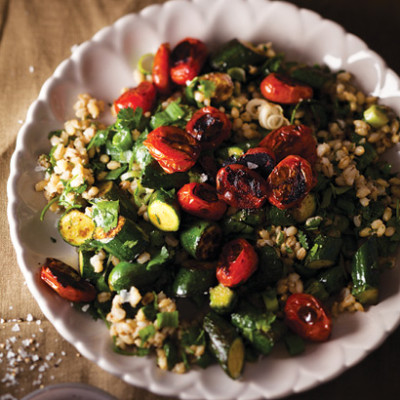 Barley salad with sauteed baby rosa tomatoes and baby marrows