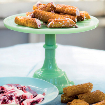 Brandy snaps with berry cream