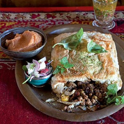 Chicken, cranberry and olive empanada with chimichurri