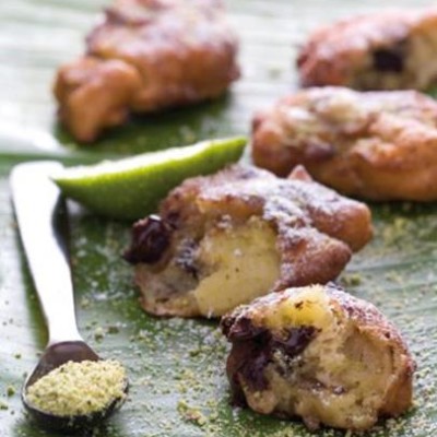 Chocolate, banana and blue cheese dumplings with pistachio dust