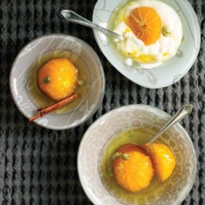 Clementines poached in apple and cardamom syrup