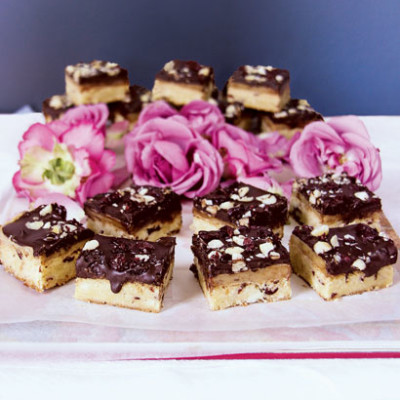 Cranberry and macadamia chocolate millionares shortbread