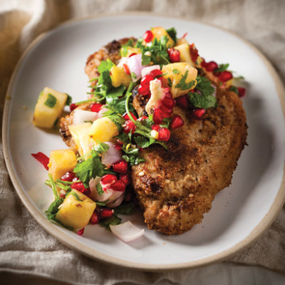 Crumbed pork steak with pineapple salsa