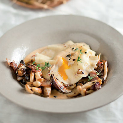 Duck egg ravioli with exotic mushroom sauce