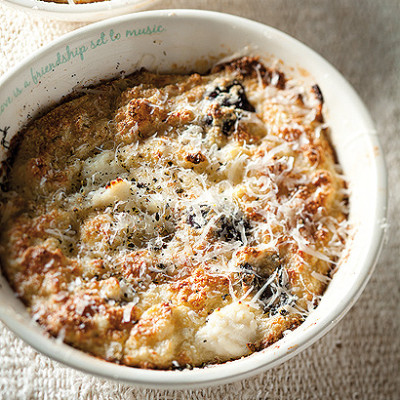 Fluffy ricotta and olive-baked eggs