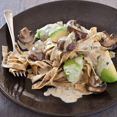 Fresh wholewheat pasta tossed with panfried mushroom, ripe avo and cream