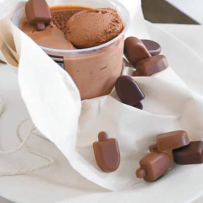 Frozen classic chocolate mousse with little chocolate lollies