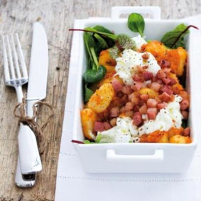 Gnocchi in red pepper sauce with crispy pancetta and shredded mozzarella