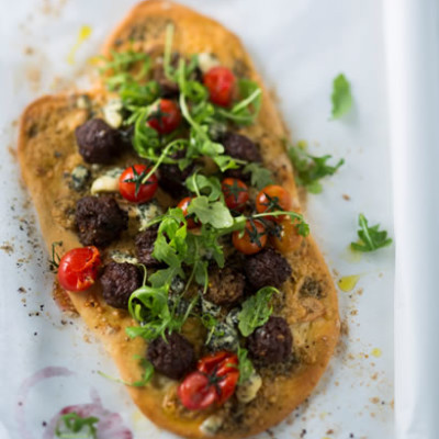 Gorgonzola and garlic foccacia topped with beef meatballs and rocket