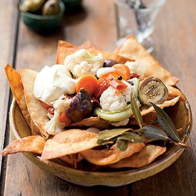 Handmade nachos and pickled vegetables