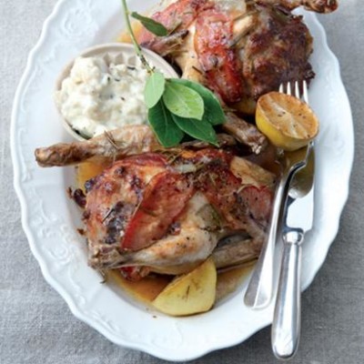 Lemon and bacon poussins with a garlicky bread sauce