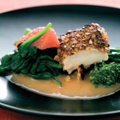 Macadamia nut-crusted tofu with greens and grapefruit cream