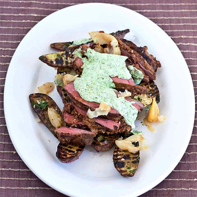 Marinated butterflied leg of lamb with sweet potatoes and garlic-coriander pesto