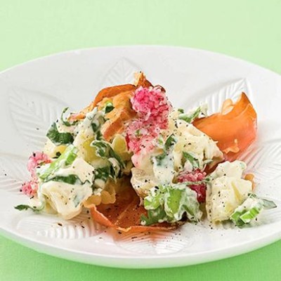 New-style creamy summer potato salad with baked serrano wafers and radish shavings