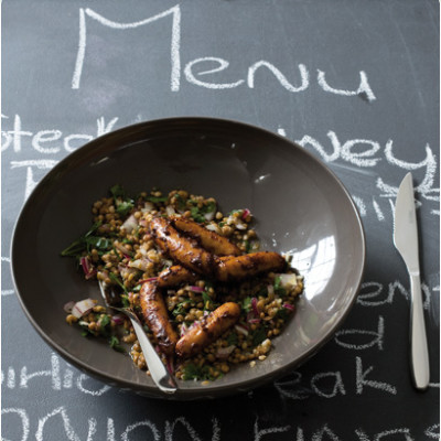 Oven-roasted red pepper and chilli bangers with lentil salad