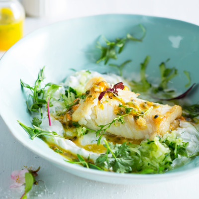 Pan-fried hake with granadilla dressing and tzatziki