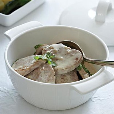 Pan-fried pork medallions with coconut-sweet potato salad