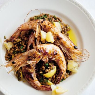 Pan-fried prawns on lentil salad