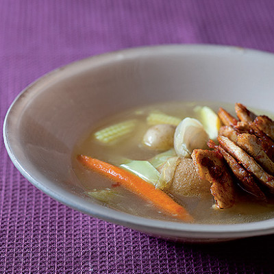 Pesto chicken broth with baby vegetables