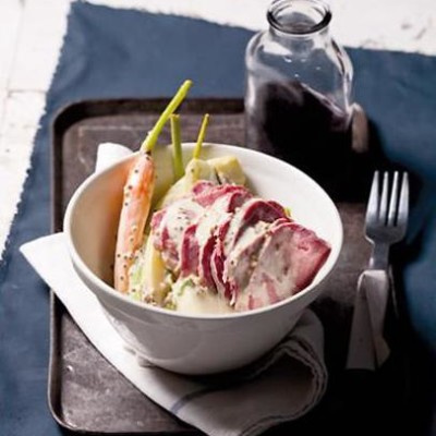 Poached tongue in a mustard cream with root vegetables