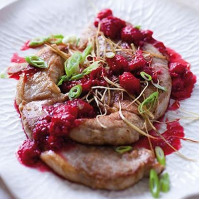 Pork steaks with cassis raspberry sauce and ginger straws