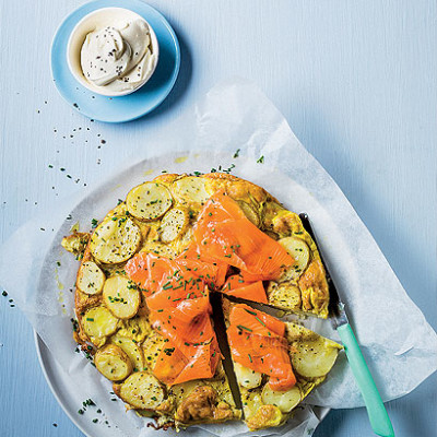 Potato omelette with smoked salmon trout and creme fraiche