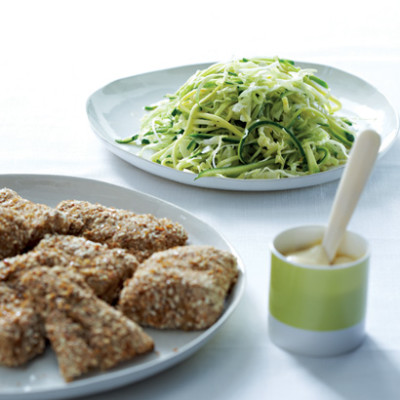 Pretzel-crumbed fish fillets with mustard mayonnaise and summer squash slaw