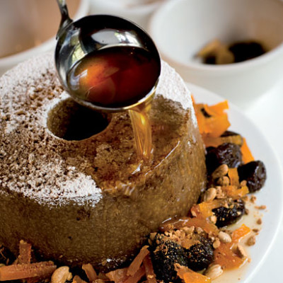 Pumpkin cake with prunes in dessert wine syrup and candied pumpkin