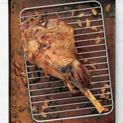 Roast leg of lamb with garlic sauce