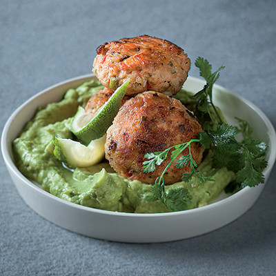 Salmon fish cakes with crushed avocado