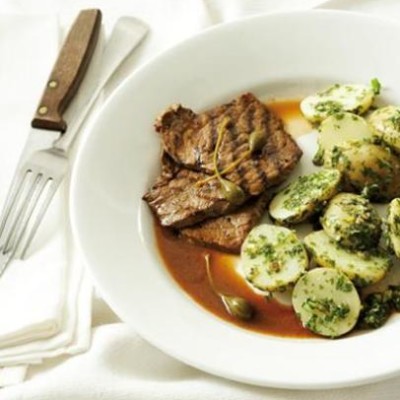 Seared beef schnitzel with salsa verde potato salad