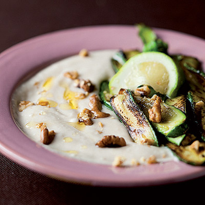 Skordalia with fried baby marrow and lemon