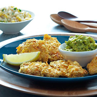 Spiced nacho-crumbed chicken with avocado and fresh corn rice