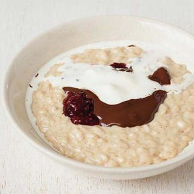 Vanilla rice pudding with strawberry jam and dark chocolate