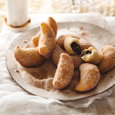 Warm chocolate beignets in cinnamon sugar