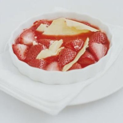 Warm organic strawberries with organic white chocolate