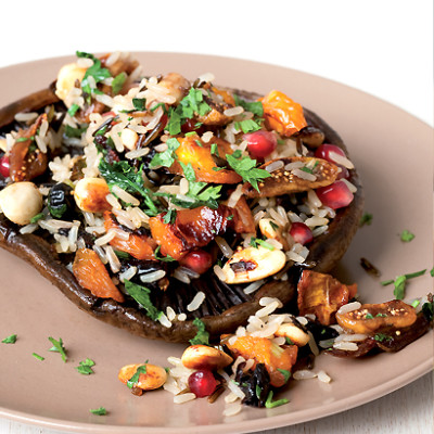 Wild brown rice salad on grilled brown mushrooms